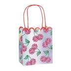 Holographic cherry gift bag with pink handles for birthday from Parte Haus party supply store in Bethesda MD.