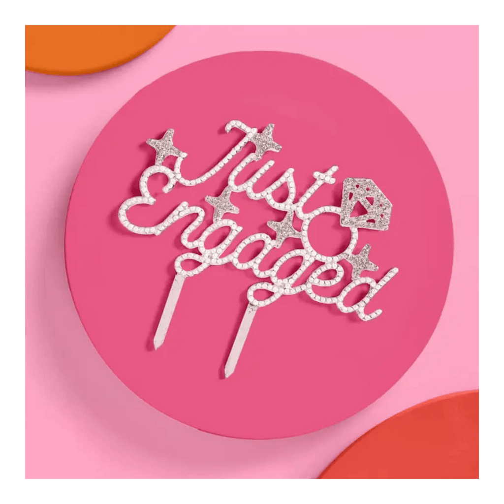 Silver Just Engaged cake topper with glitter stars engagement theme from Parte Haus party supply store in Bethesda MD