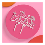 Silver Just Engaged cake topper with glitter stars engagement theme from Parte Haus party supply store in Bethesda MD