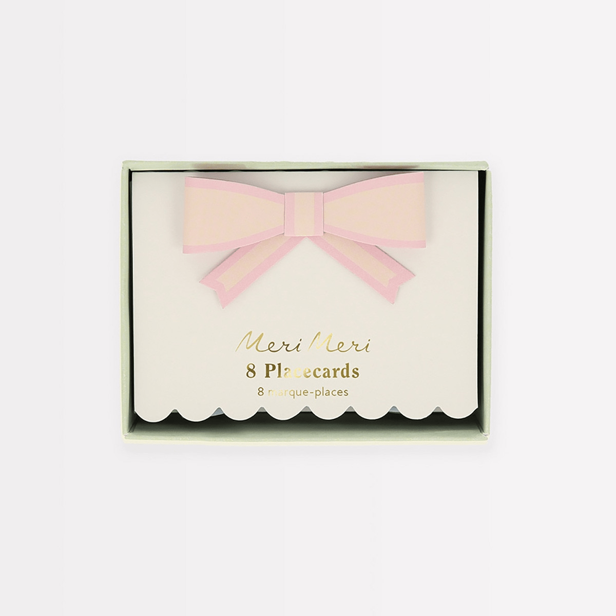 Pink bow placecards with scalloped edges for celebrations from Parte Haus party supply store in Bethesda MD
