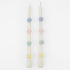 Pastel floral taper candles with rose decorations for spring celebration from Parte Haus party supply store in Bethesda MD