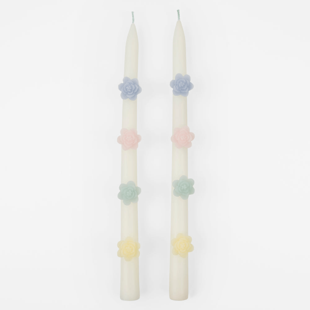 Pastel floral taper candles with rose decorations for spring celebration from Parte Haus party supply store in Bethesda MD