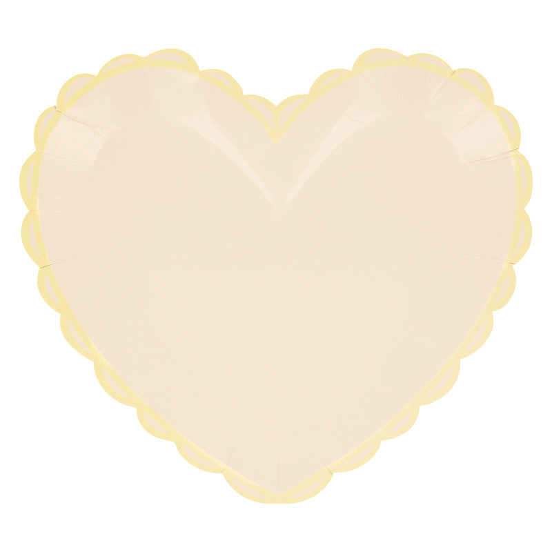 Pale yellow heart shaped plate with scalloped edges for birthday or celebration from Parte Haus party supply store in Bethesda MD