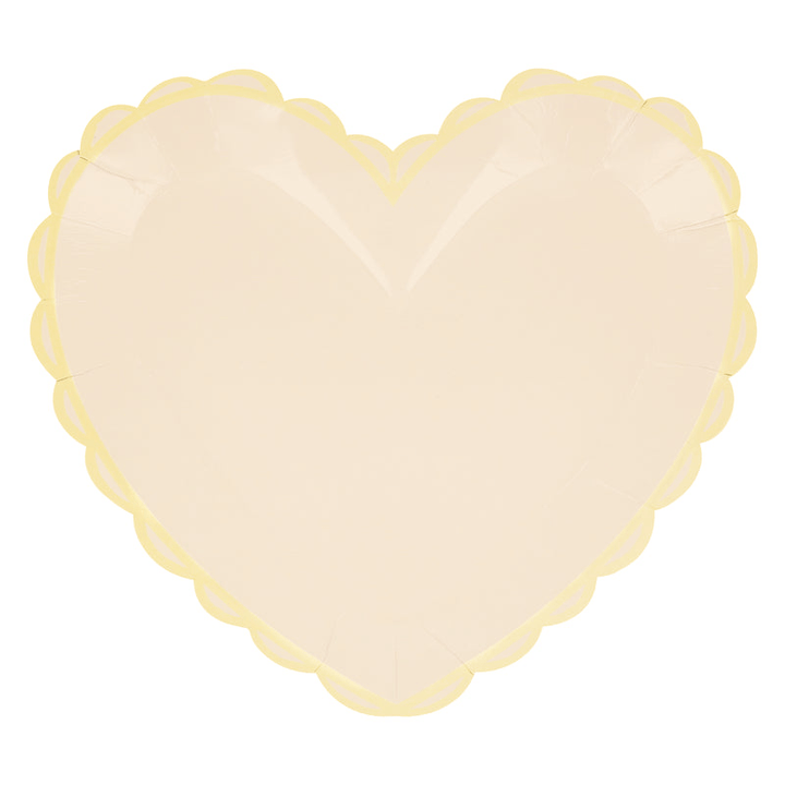 Pale yellow heart shaped plate with scalloped edges for birthday or celebration from Parte Haus party supply store in Bethesda MD
