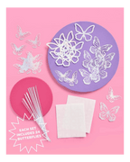 White butterfly cutouts diy butterfly cake toppers birthday theme from Parte Haus party supply store in Bethesda Maryland