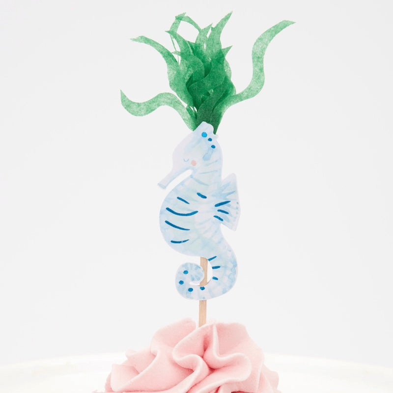 Blue seahorse cake topper with green seaweed for under the sea theme from Parte Haus party supply store in Bethesda MD