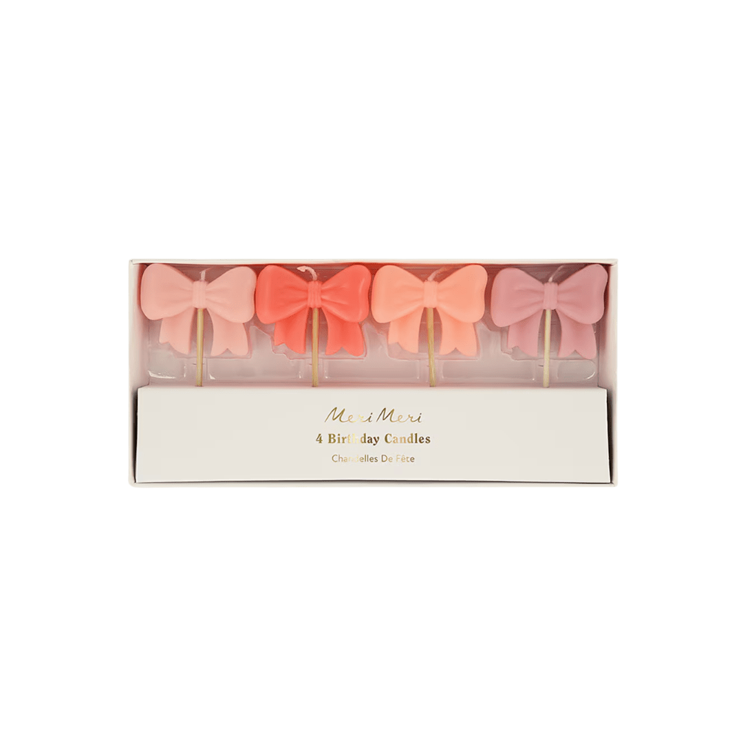 Pink bow birthday candles in a gift box for birthday theme from Parte Haus party supply store in Bethesda Maryland