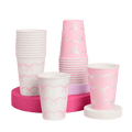 Pink pastel cups with bow design birthday decoration set from Parte Haus party supply store in Bethesda MD