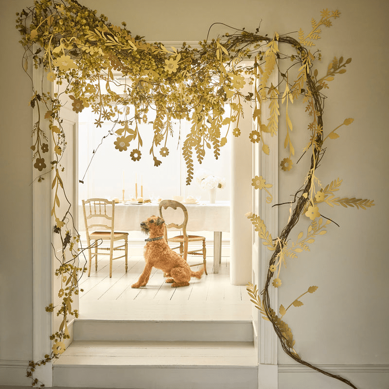 Gold floral garland doorway decor spring botanical theme from Parte Haus party supply store in Bethesda Maryland
