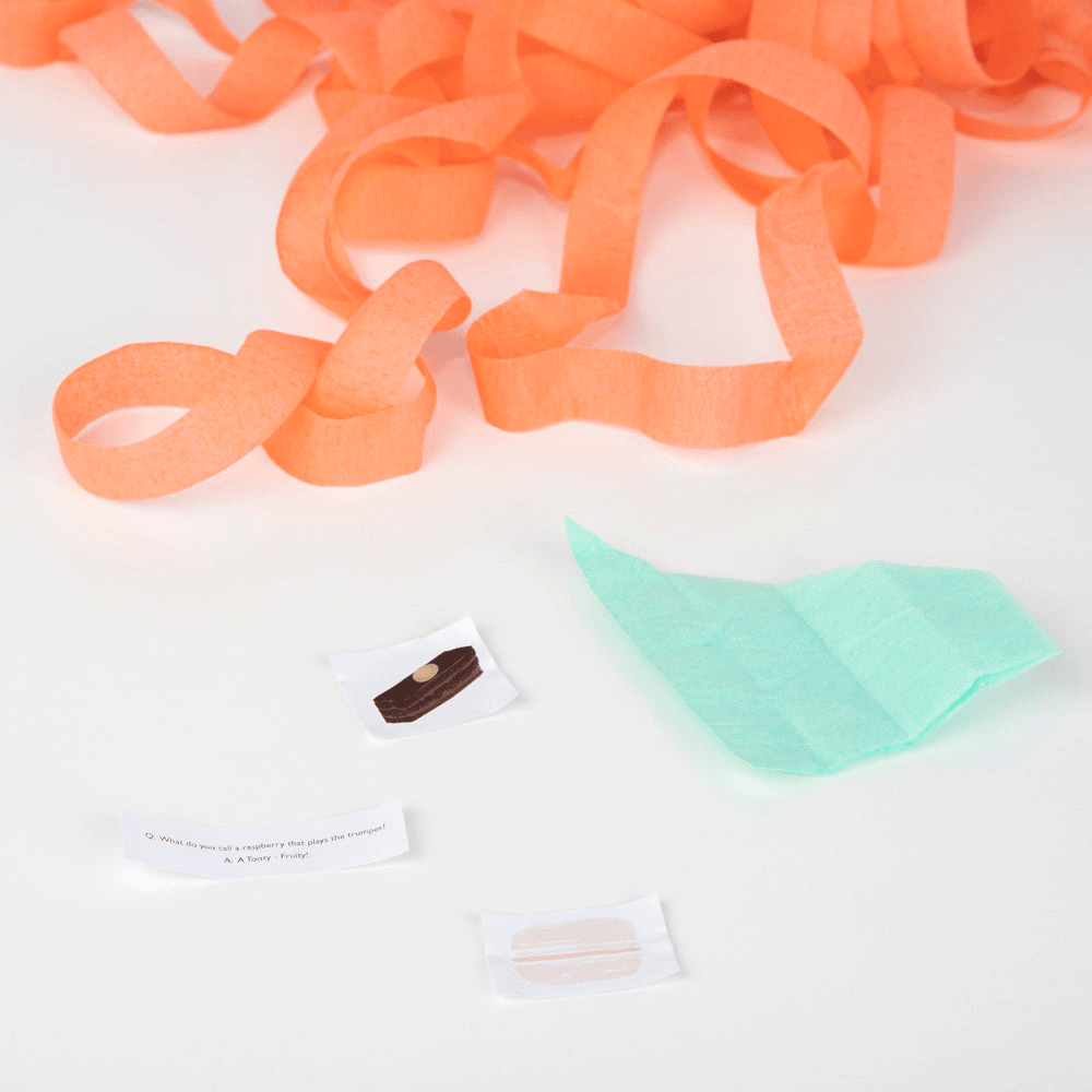 Peach orange crepe paper streamer with party favor notes birthday theme from Parte Haus party supply store in Bethesda Maryland