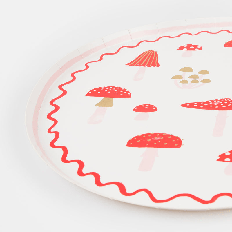 Red mushroom paper plate with whimsical design woodland theme from Parte Haus party supply store in Bethesda MD