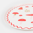 Red mushroom paper plate with whimsical design woodland theme from Parte Haus party supply store in Bethesda MD