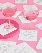 Pink she said yes napkins with pastel lettering engagement theme from Parte Haus party supply store in Bethesda MD