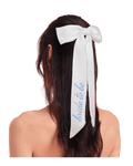 White bride to be hair bow with blue script for bridal shower from Parte Haus party supply store in Bethesda MD