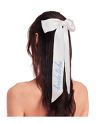 White bride to be hair bow with blue script for bridal shower from Parte Haus party supply store in Bethesda MD