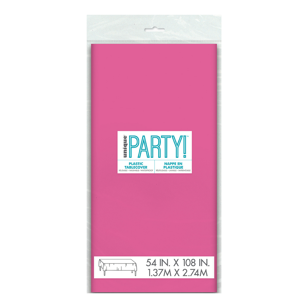 Pink plastic tablecover in packaging for birthday celebration from Parte Haus party supply store in Bethesda Maryland