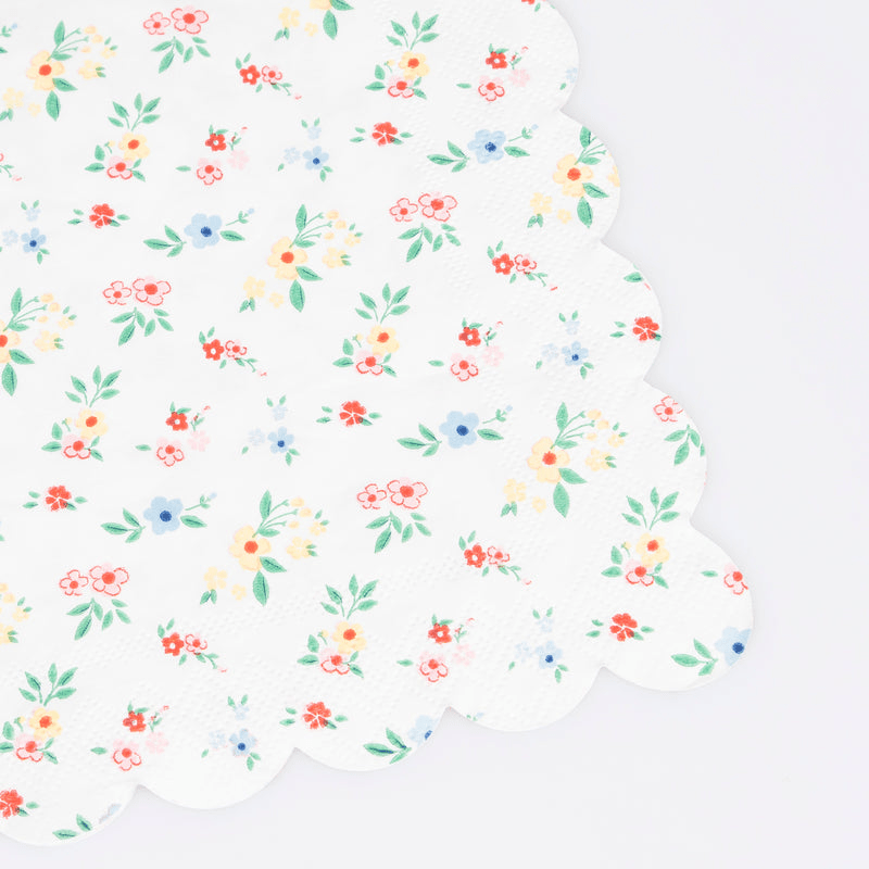 Multicolor floral paper napkin with scalloped edge spring design from Parte Haus party supply store in Bethesda MD.
