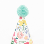 multicolor floral party hat with aqua pom pom for birthday celebration from Parte Haus party supply store in Bethesda MD