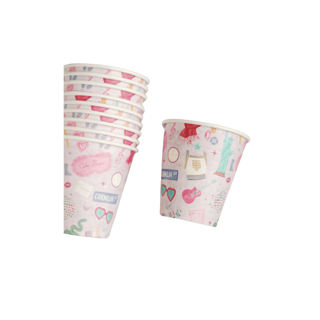 Pink paper cups with colorful illustrations for celebration theme from Parte Haus party supply store in Bethesda Maryland