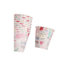 Pink paper cups with colorful illustrations for celebration theme from Parte Haus party supply store in Bethesda Maryland