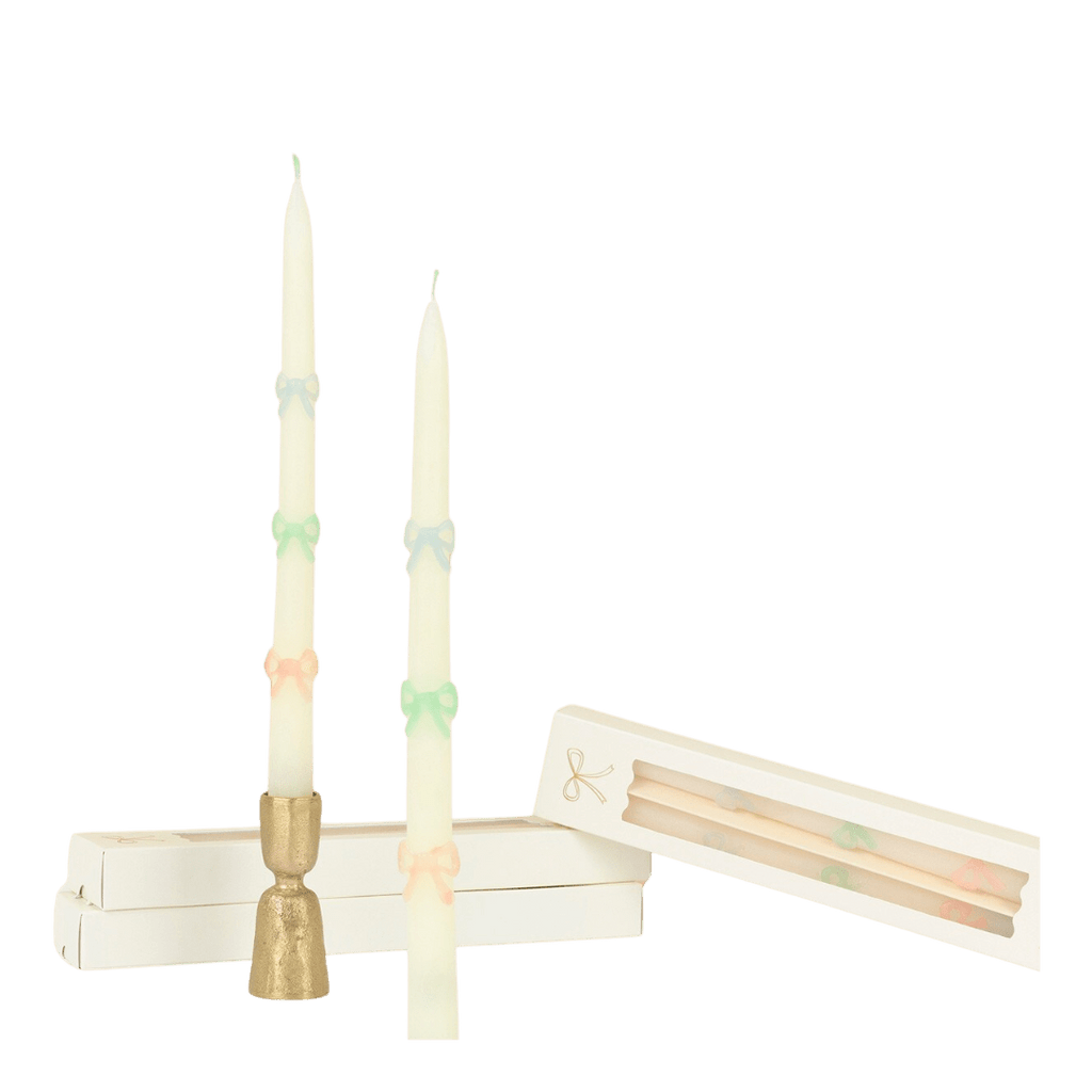 Pastel bow tall candles featuring bow designs for birthday or baby shower from Parte Haus party supply store in Bethesda MD