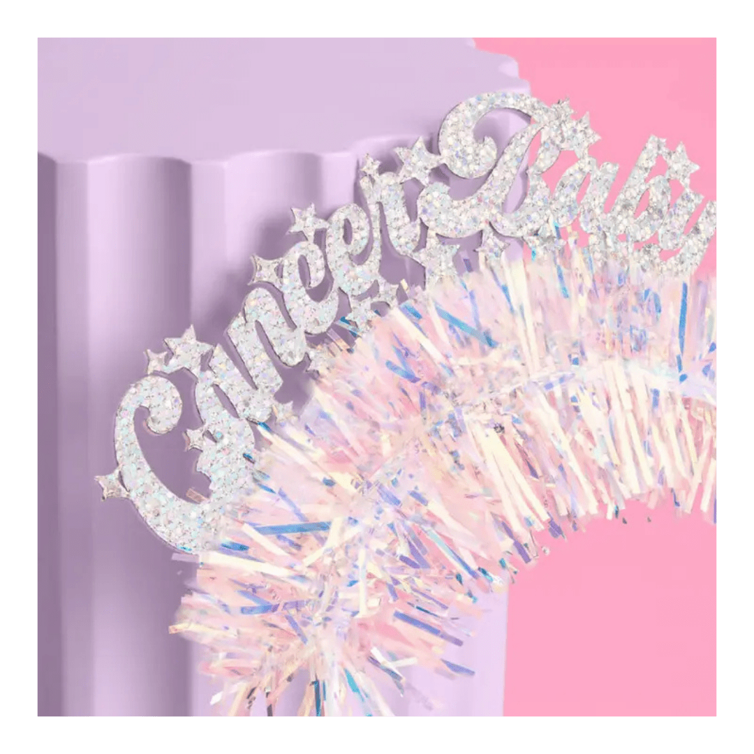 Silver glitter Sweet Baby cake topper with iridescent tinsel for baby shower from Parte Haus party supply store in Bethesda MD.