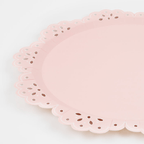 Pink scalloped plate with cutout edge for birthday from Parte Haus party supply store in Bethesda Maryland