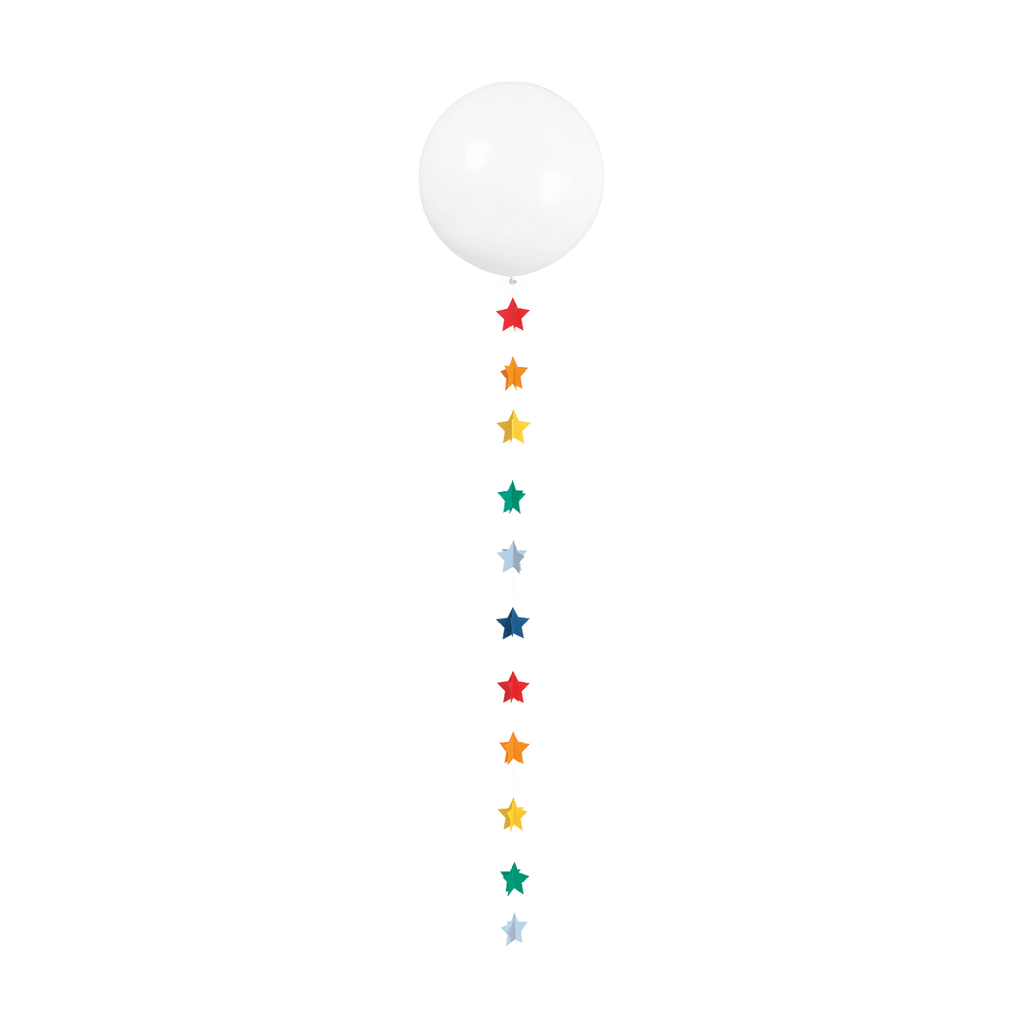 White balloon with rainbow star garland birthday decor from Parte Haus party supply store in Bethesda MD
