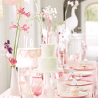 Pastel pink birthday table decor with cakes and flowers for garden celebration from Parte Haus party supply store in Bethesda MD