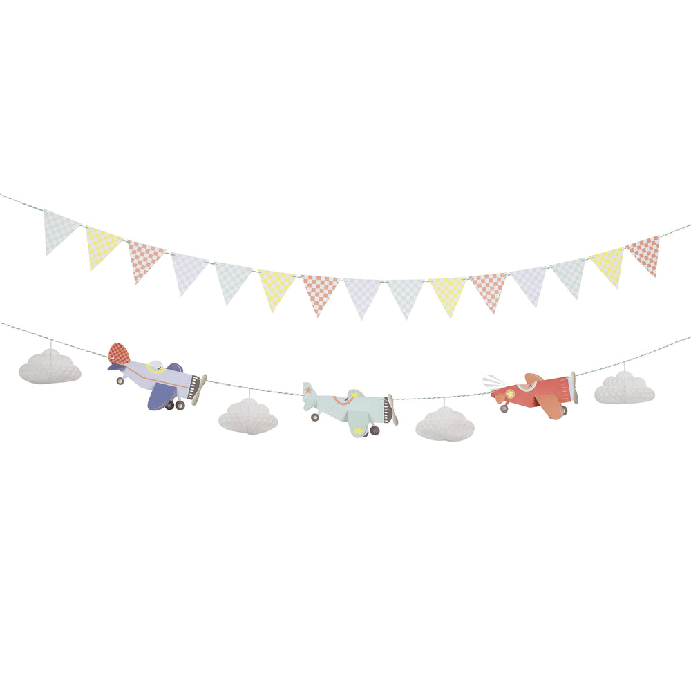 Pastel airplane and cloud garland with checkered pennant banner for kids birthday theme from Parte Haus party supply store in Bethesda MD