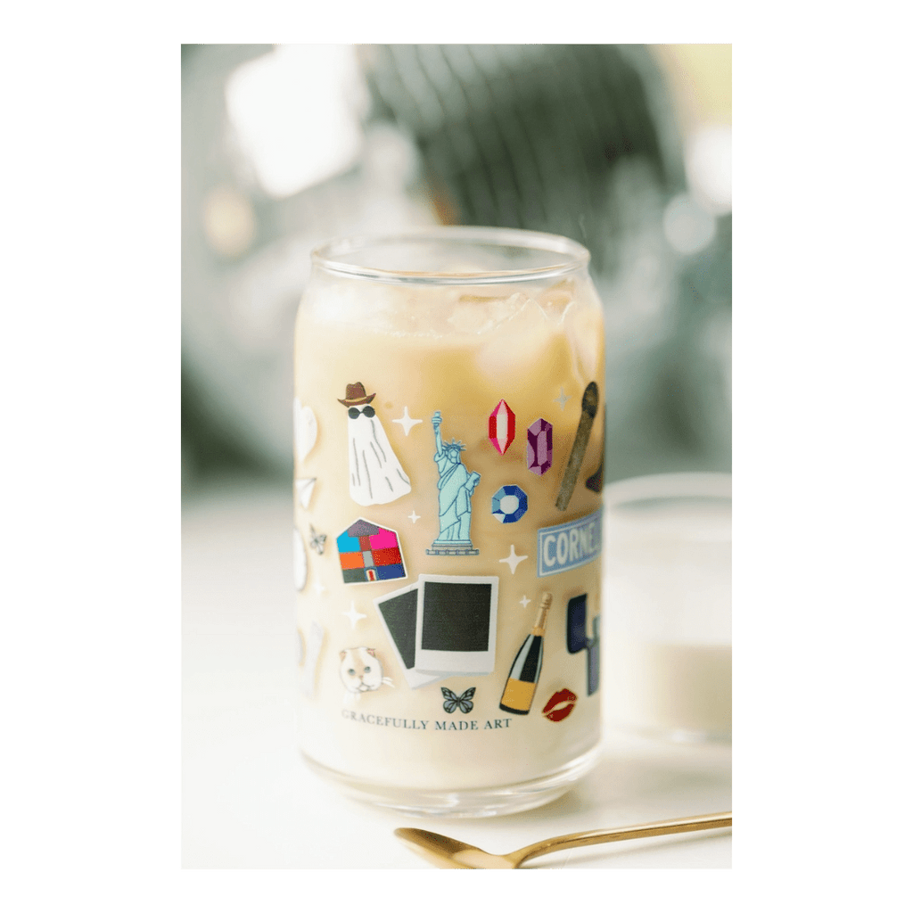 clear sticker glass cup with colorful icons and iced coffee for general celebration from Parte Haus party supply store in Bethesda Maryland