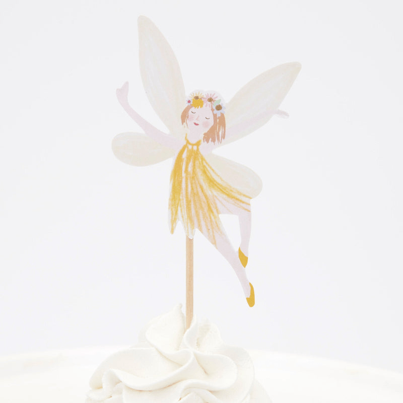 Yellow fairy cake topper with floral crown whimsical birthday from Parte Haus party supply store in Bethesda MD