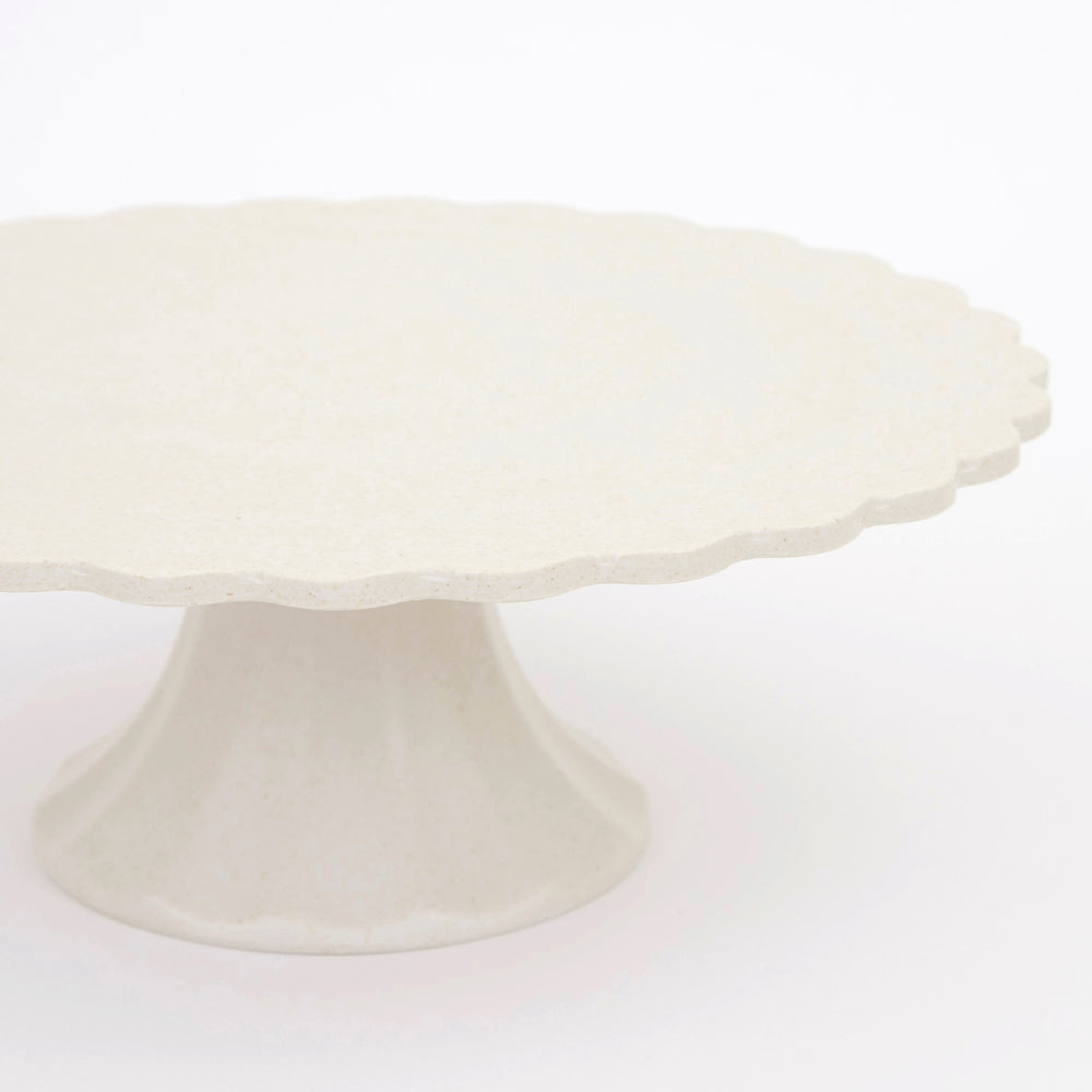 Ivory cake stand with scalloped edge for celebration from Parte Haus party supply store in Bethesda Maryland