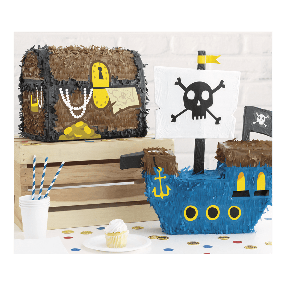 Brown and blue pirate themed piñata treasure chest and pirate ship for birthday from Parte Haus party supply store in Bethesda Maryland