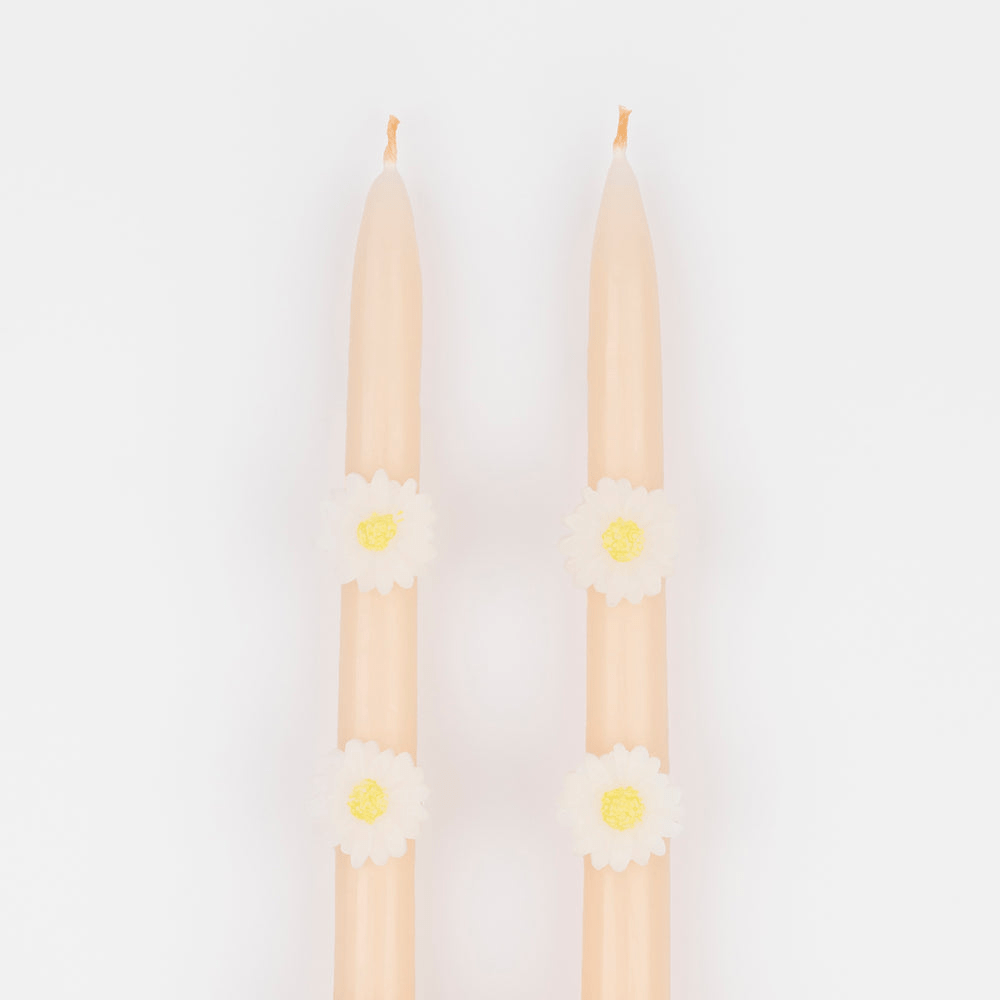 Beige floral taper candles with white daisies spring theme from Parte Haus party supply store in Bethesda MD.