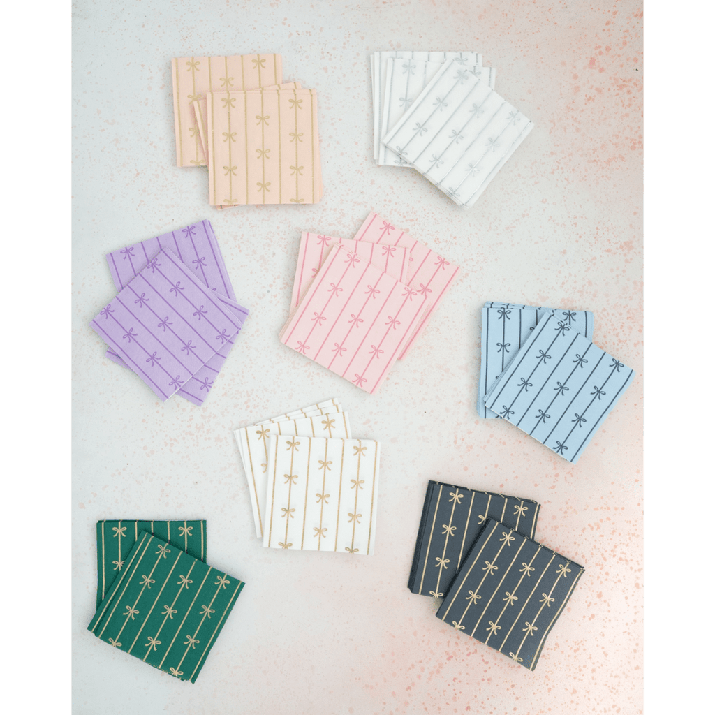 Multicolor bow design napkins elegant striped napkin set holiday theme from Parte Haus party supply store in Bethesda MD