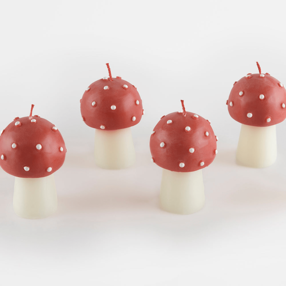 Red and white mushroom candle whimsical decor for woodland party theme from Parte Haus party supply store in Bethesda Maryland.