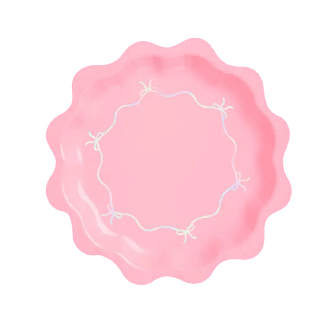 Pink scalloped paper plate with white bow design birthday theme from Parte Haus party supply store in Bethesda MD