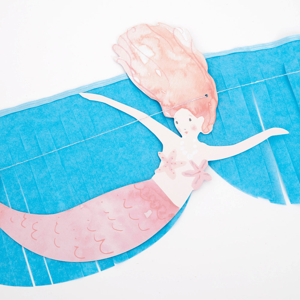 Pink mermaid paper garland beach birthday decoration from Parte Haus party supply store in Bethesda Maryland