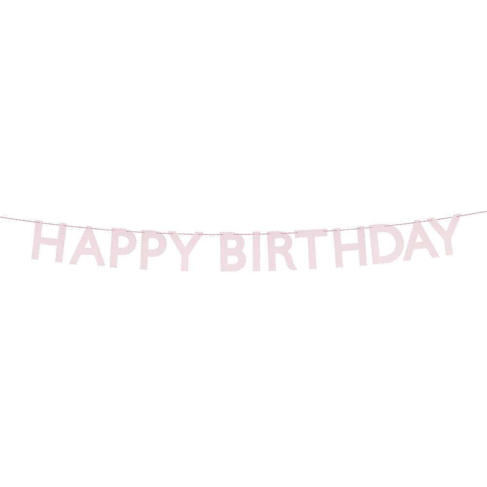 Light pink happy birthday banner with bold cutout letters birthday theme from Parte Haus party supply store in Bethesda MD