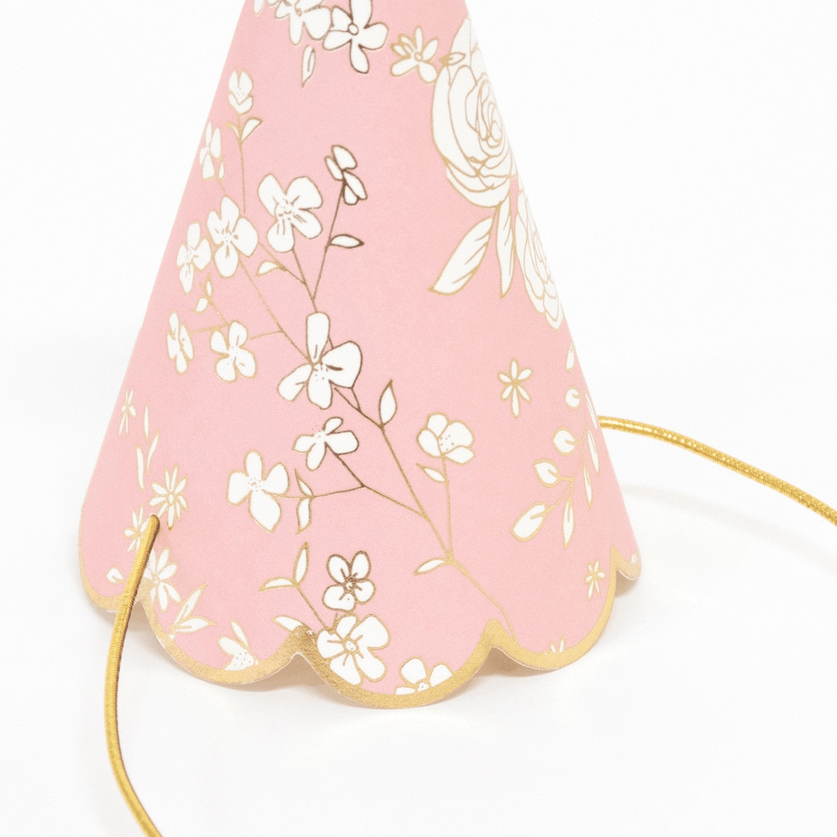 Pink floral party hat with gold trim for birthday celebration from Parte Haus party supply store in Bethesda MD
