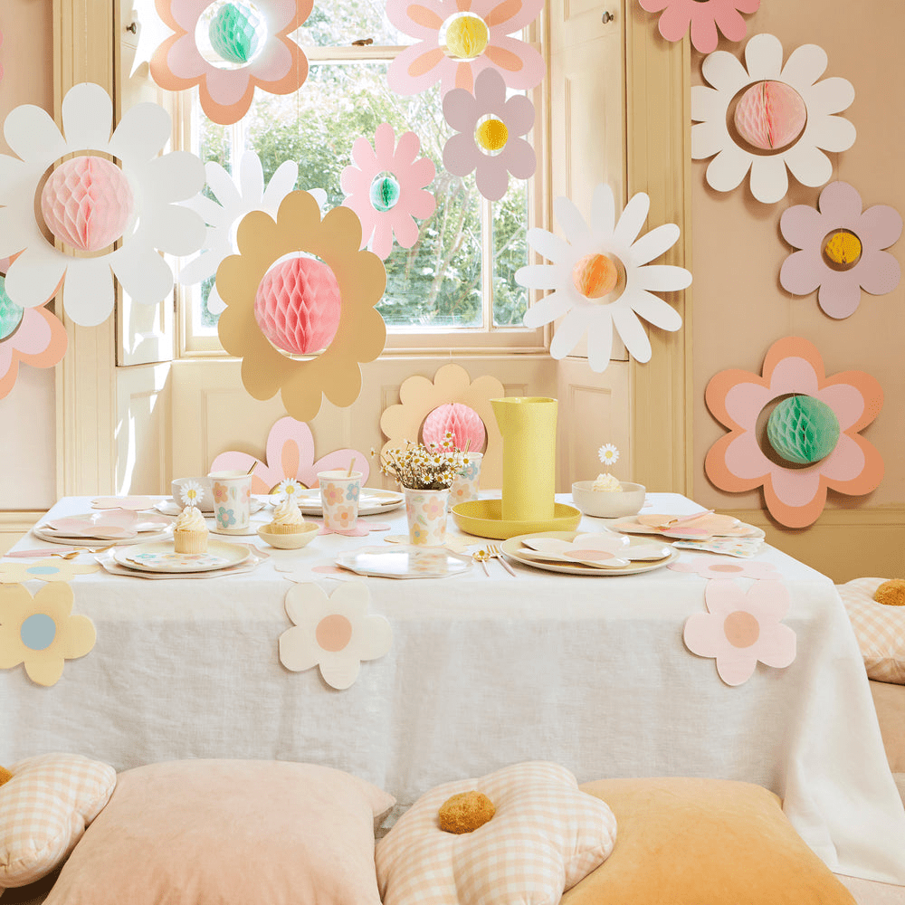 Pastel flower wall decorations and tableware daisy garden theme from Parte Haus party supply store in Bethesda MD