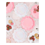 Pink and white scalloped paper plates with bows tea party theme from Parte Haus party supply store in Bethesda Maryland