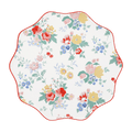 Multicolor floral scalloped plate with red yellow and blue flowers for spring from Parte Haus party supply store in Bethesda MD