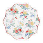 Multicolor floral scalloped plate with red yellow and blue flowers for spring from Parte Haus party supply store in Bethesda MD