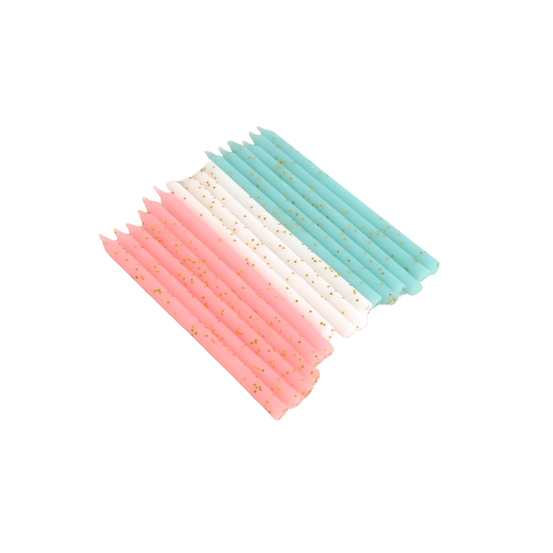 Pink white teal birthday candles with gold glitter from Parte Haus party supply store in Bethesda Maryland