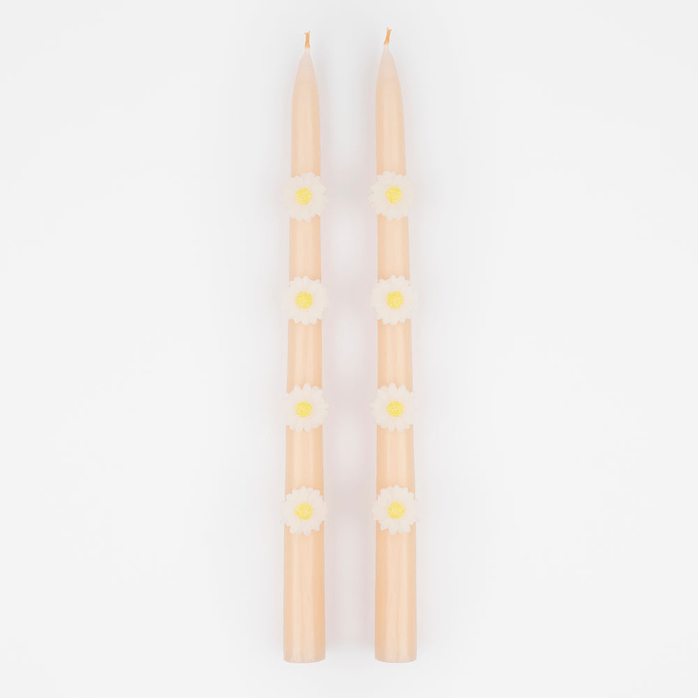 Pastel pink taper candles with white daisy flowers spring decor from Parte Haus party supply store in Bethesda MD