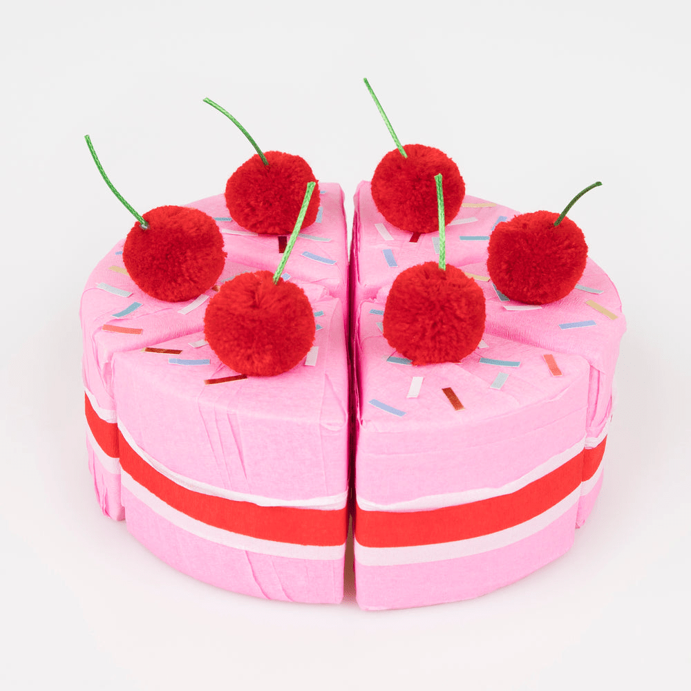 Pink cake slice favor box with fake red cherries birthday theme from Parte Haus party supply store in Bethesda Maryland
