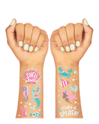 Blue and pink mermaid temporary tattoos with sea creatures for birthday from Parte Haus party supply store in Bethesda Maryland
