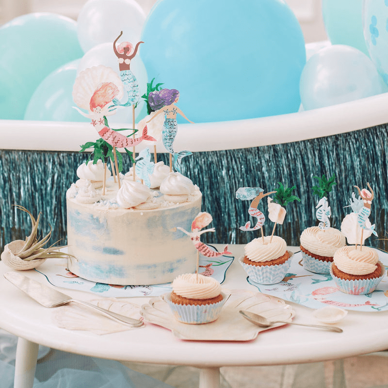 Blue mermaid cake and cupcake toppers for under the sea birthday from Parte Haus party supply store in Bethesda Maryland